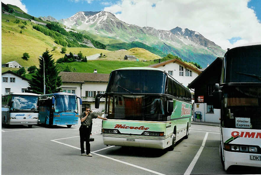 (048'724) - Hrzeler, Dietikon - Nr. 4/ZH 138'790 - Neoplan am 23. Juli 2001 beim Bahnhof Andermatt