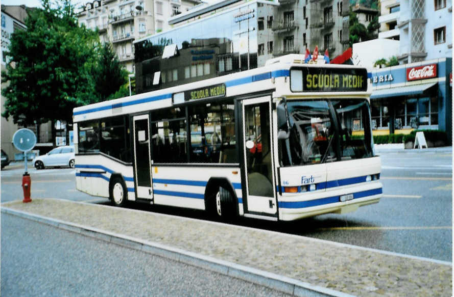 (099'827) - FART Locarno - Nr. 86/TI 308'886 - Neoplan am 4. oktober 2007 beim Bahnhof Locarno