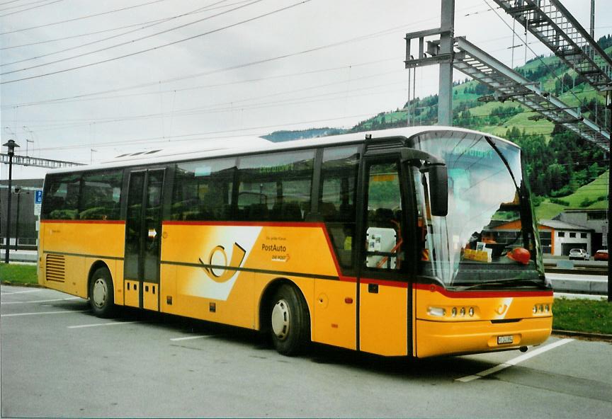 (107'533) - PostAuto Wallis - VS 243'894 - Neoplan (ex P 25'168) am 26. Juni 2008 beim Bahnhof Frutigen