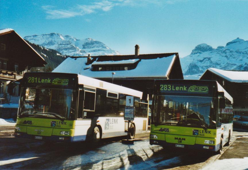 (113'321) - AFA Adelboden - Nr. 56/BE 611'030 + Nr. 55/BE 611'055 - MAN/Gppel am 24. Dezember 2008 beim Bahnhof Lenk