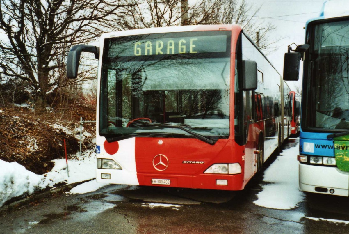 (114'233) - TPF Fribourg - Nr. 585/FR 300'402 - Mercedes am 14. Februar 2009 in Fribourg, Garage