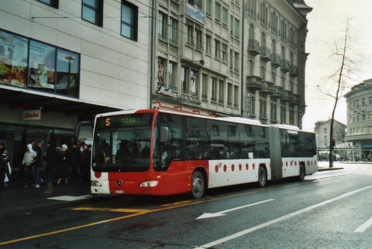 (114'312) - TPF Fribourg - Nr. 591/FR 300'400 - Mercedes am 14. Februar 2009 beim Bahnhof Fribourg