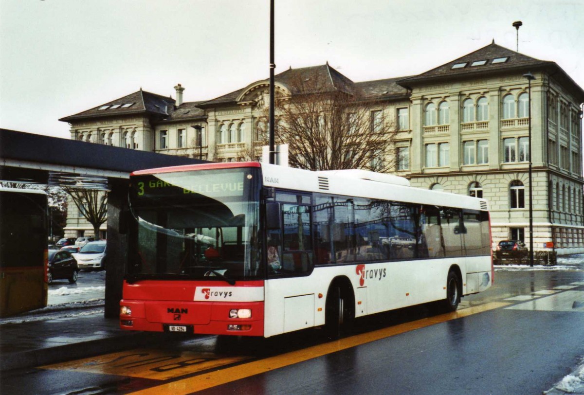 (123'236) - TRAVYS Yverdon - VD 4284 - MAN am 23. Dezember 2009 beim Bahnhof Yverdon