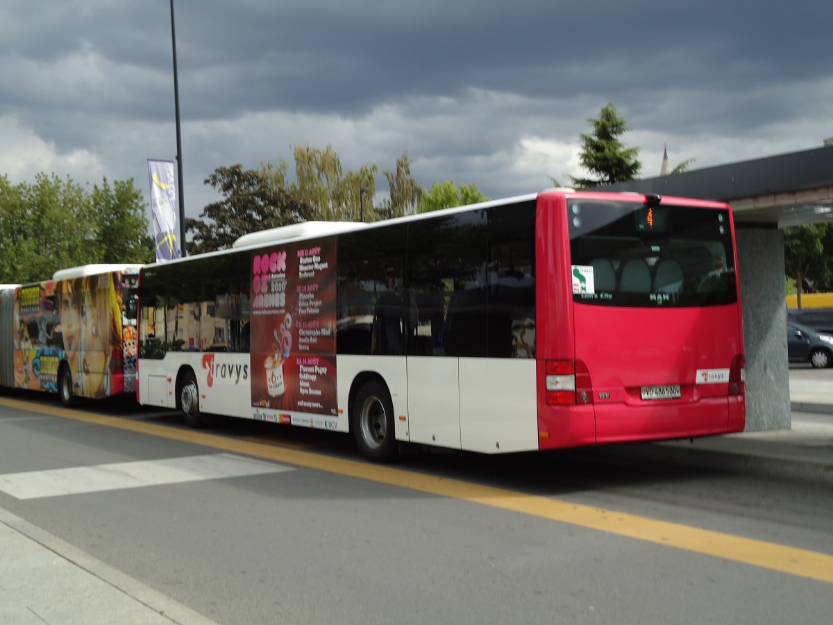 (128'102) - TRAVYS Yverdon - VD 486'500 - MAN am 26. Juli 2010 beim Bahnhof Yverdon