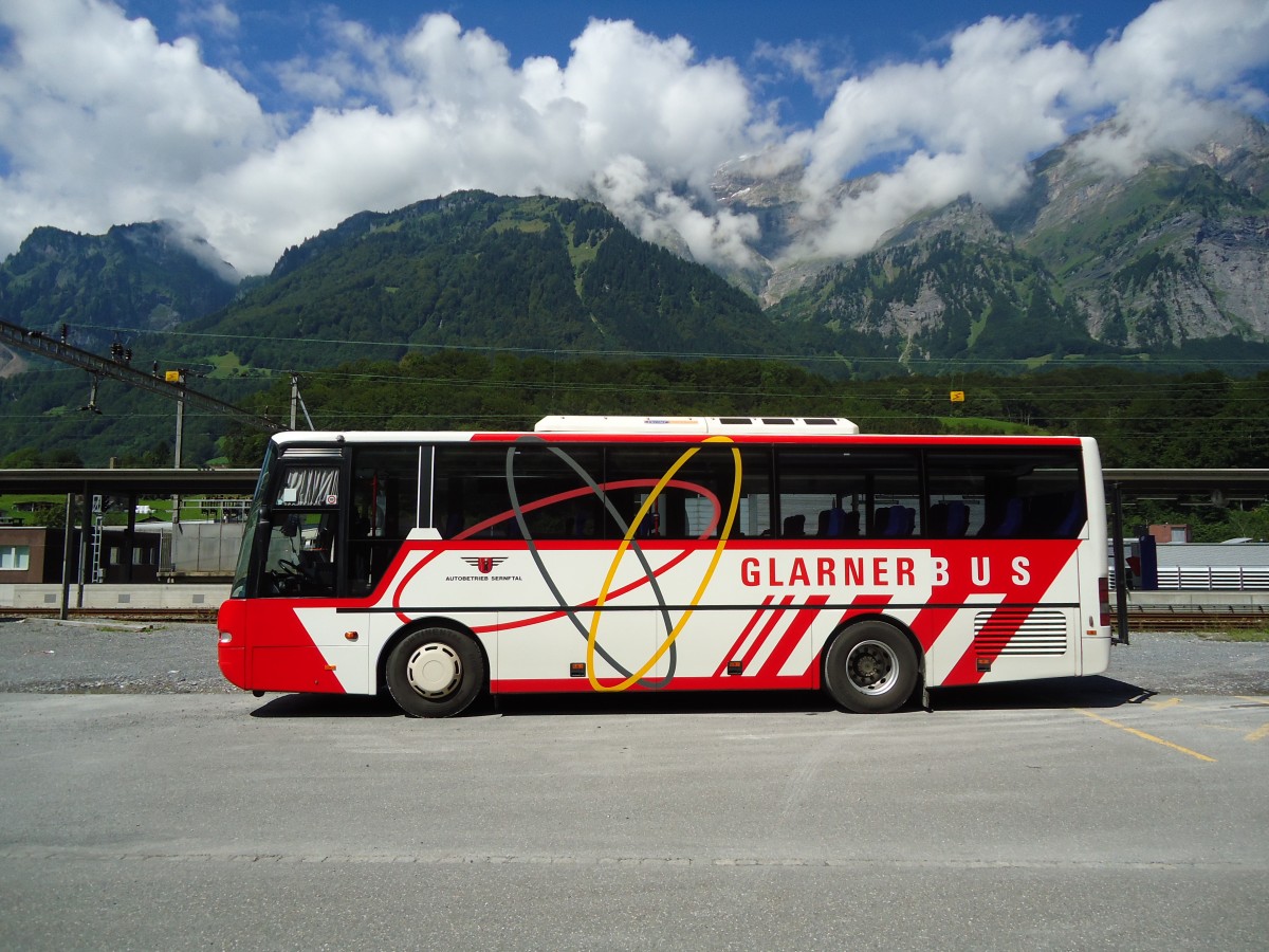 (128'254) - AS Engi - Nr. 10/GL 7710 - Neoplan am 7. August 2010 beim Bahnhof Schwanden