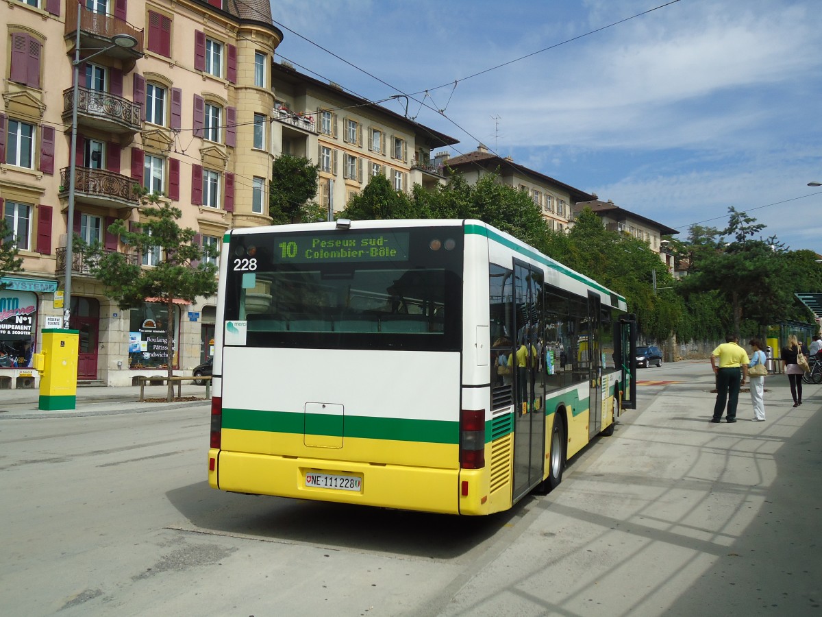 (129'582) - TN Neuchtel - Nr. 228/NE 111'228 - MAN am 6. September 2010 beim Bahnhof Neuchtel