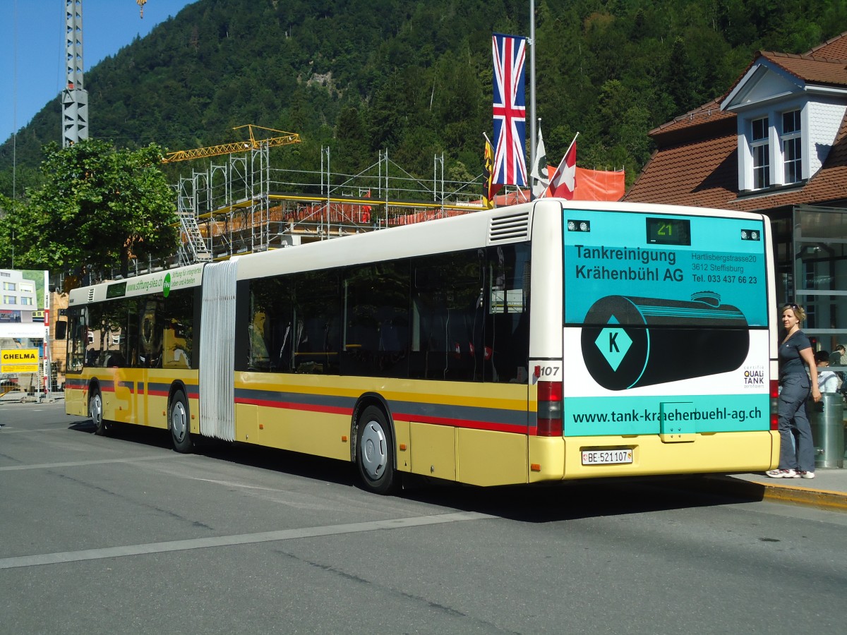 (134'667) - STI Thun - Nr. 107/BE 521'107 - MAN am 3. Juli 2011 beim Bahnhof Interlaken Ost