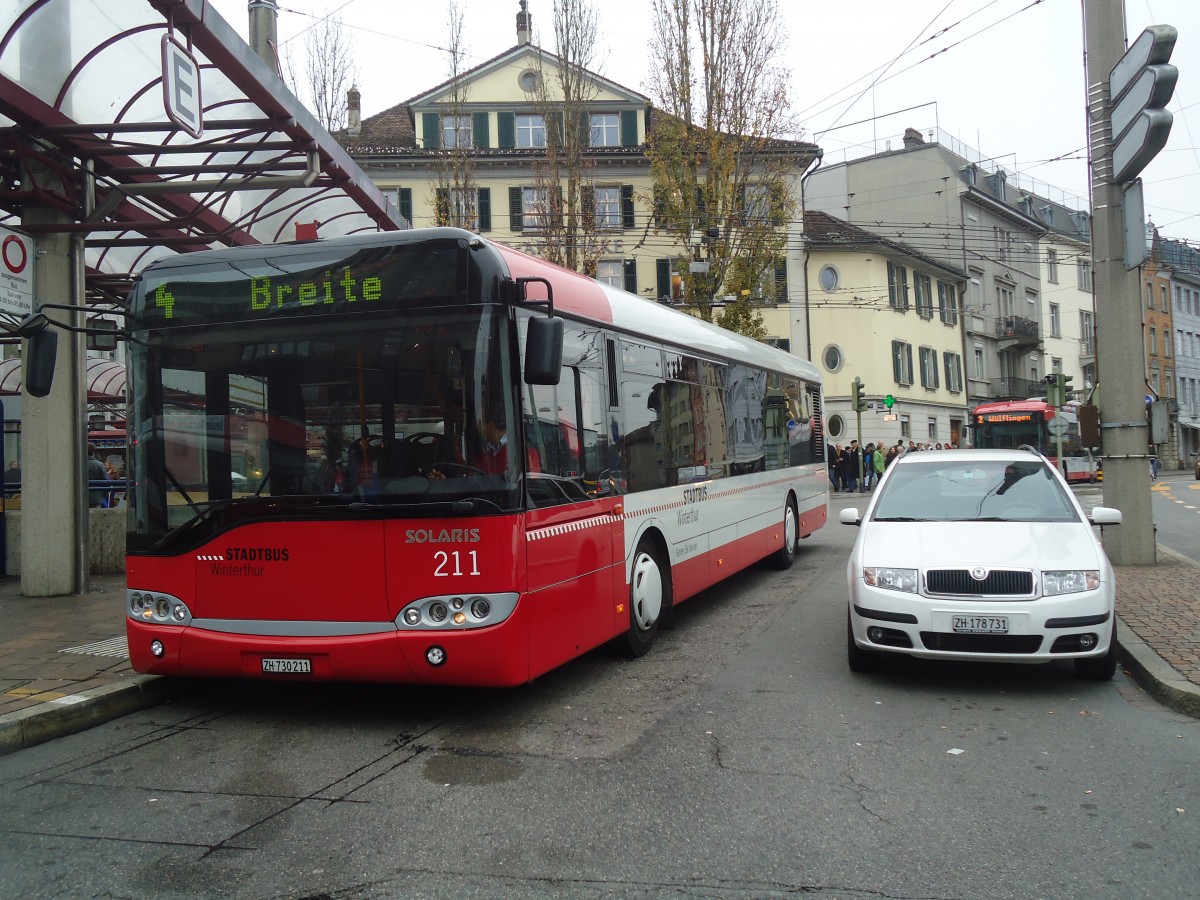 (136'945) - SW Winterthur - Nr. 211/ZH 730'211 - Solaris am 24. November 2011 beim Hauptbahnhof Winterthur