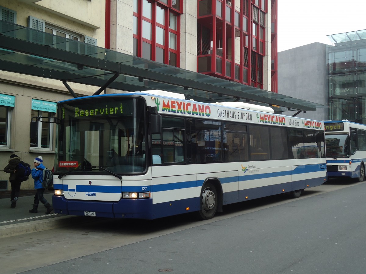 (137'963) - ZVB Zug - Nr. 127/ZG 3387 - Scania/Hess (ex Nr. 157) am 6. Mrz 2012 beim Bahnhof Zug