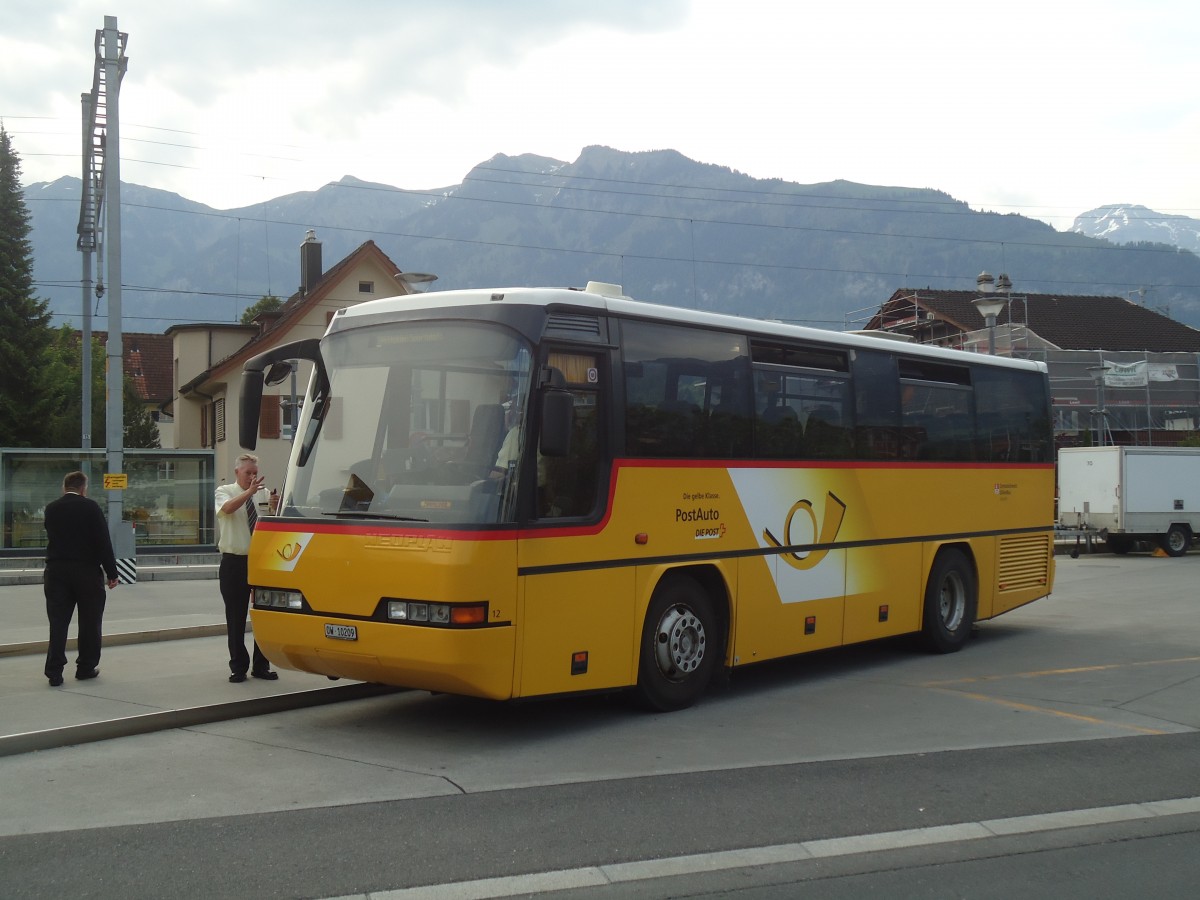 (139'030) - Dillier, Sarnen - Nr. 12/OW 10'209 - Neoplan am 27. Mai 2012 beim Bahnhof Sarnen