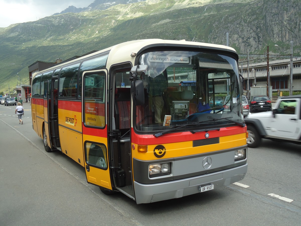 (140'246) - Mattli, Wassen - UR 9107 - Mercedes am 1. Juli 2012 beim Bahnhof Andermatt