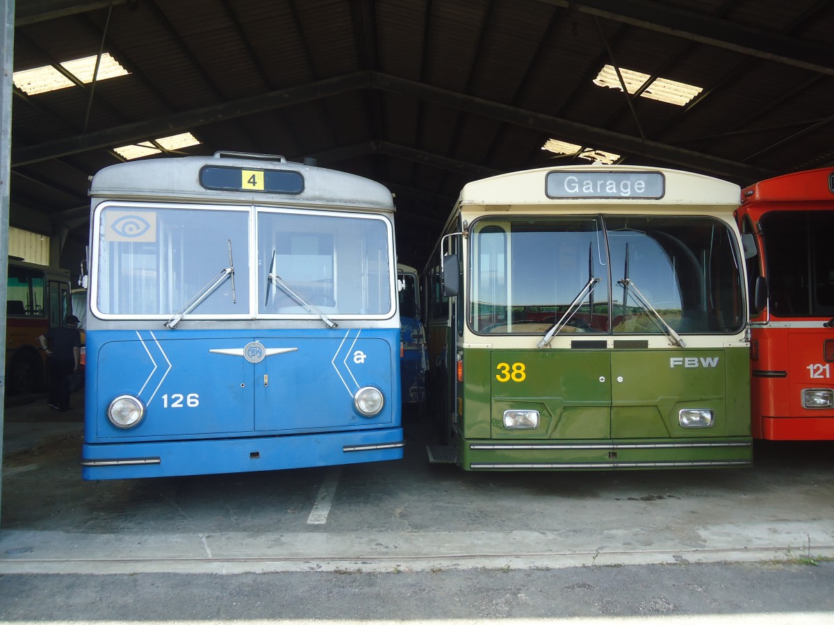 (141'277) - ACT Lugano (TVS) - Nr. 126 - FBW/Hess Trolleybus (ex RhV Altsttten Nr. 6) + SVB Bern (TVS) - Nr. 38 - FBW/R&J Gelenktrolleybus am 19. August 2012 in Yvonand, Halle TVS