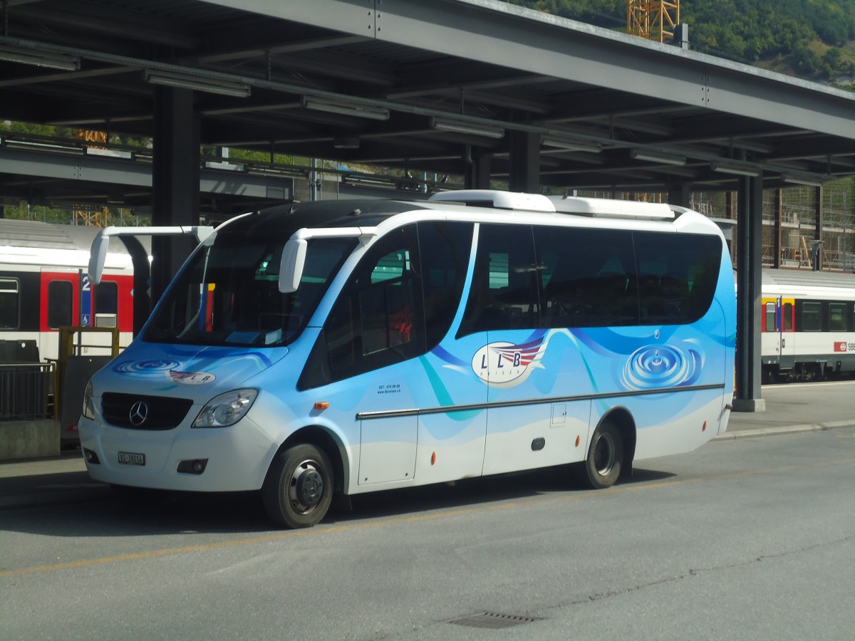 (147'311) - LLB Susten - Nr. 14/VS 38'014 - Mercedes/UNVI am 22. September 2013 beim Bahnhof Leuk