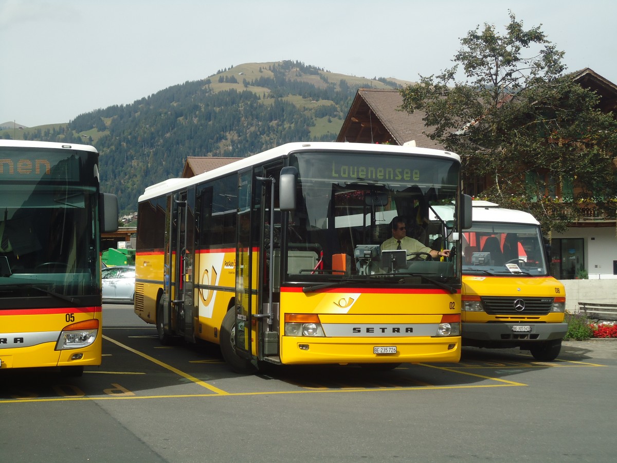 (147'394) - Kbli, Gstaad - Nr. 2/BE 235'726 - Setra am 28. September 2013 beim Bahnhof Gstaad