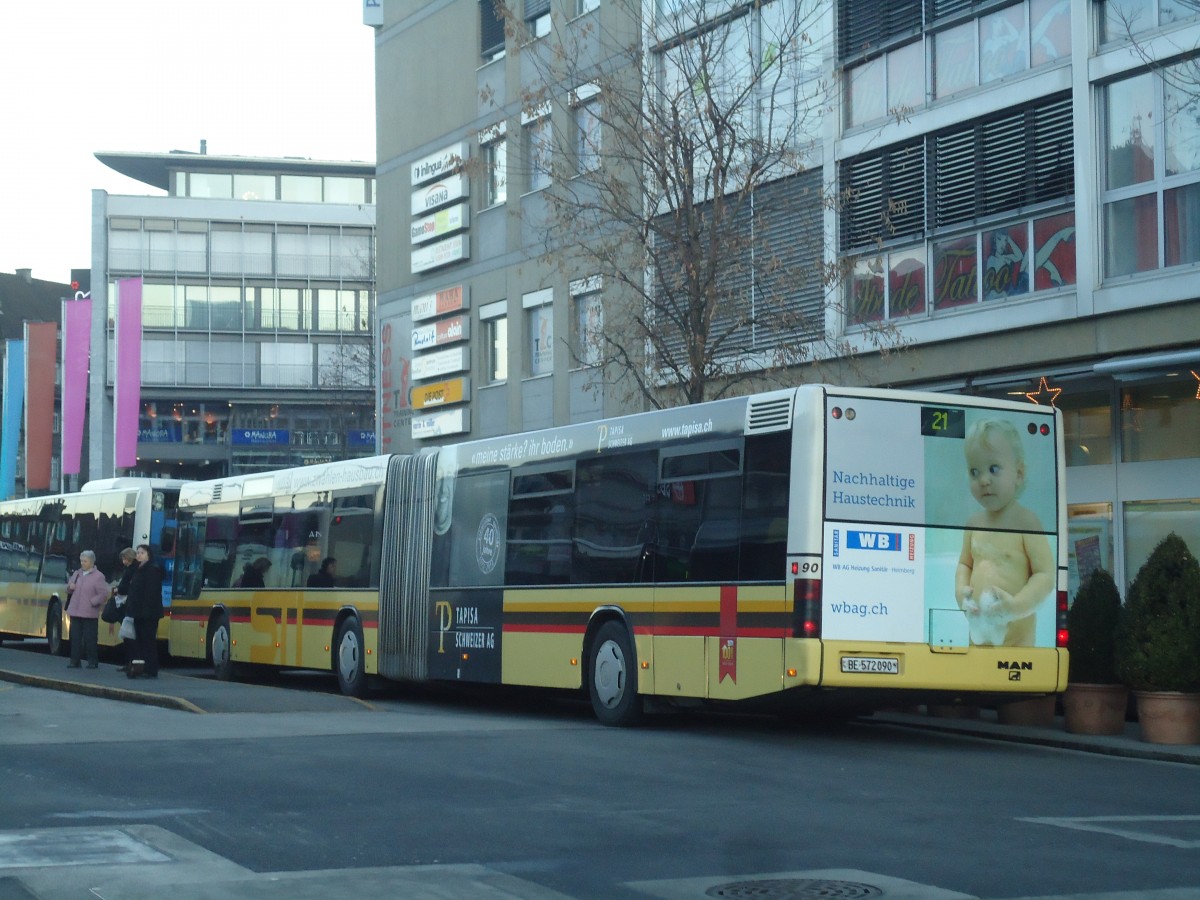 (148'596) - STI Thun - Nr. 90/BE 572'090 - MAN am 31. Dezember 2013 beim Bahnhof Thun