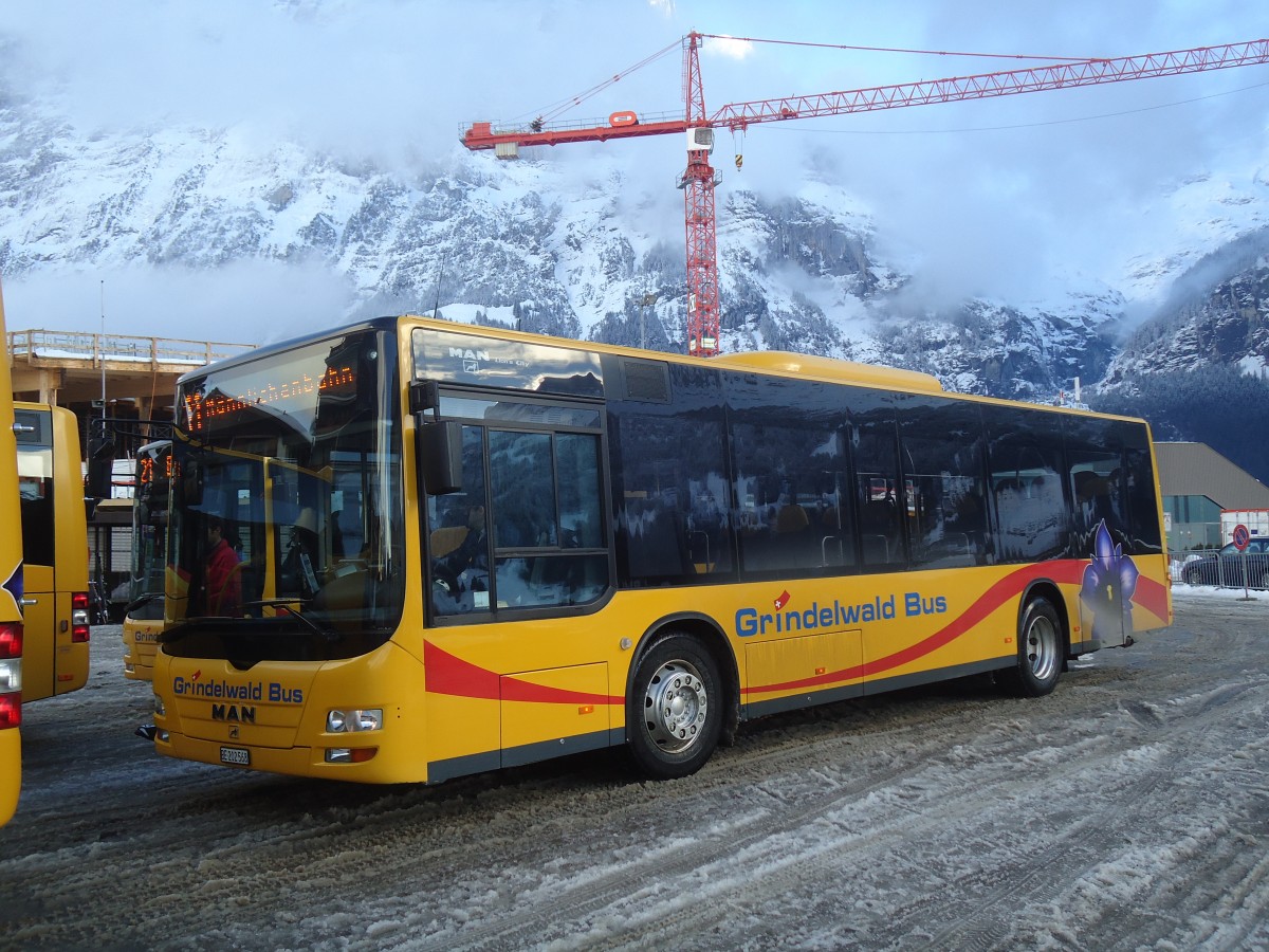 (148'630) - AVG Grindelwald - Nr. 14/BE 202'568 - MAN/Gppel am 5. Januar 2014 beim Bahnhof Grindelwald