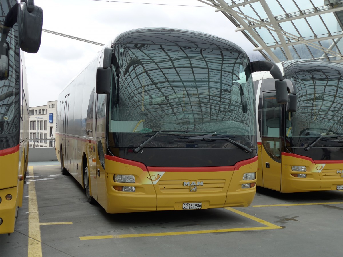 (149'109) - PostAuto Graubnden - GR 162'986 - MAN am 1. Mrz 2014 in Chur, Postautostation