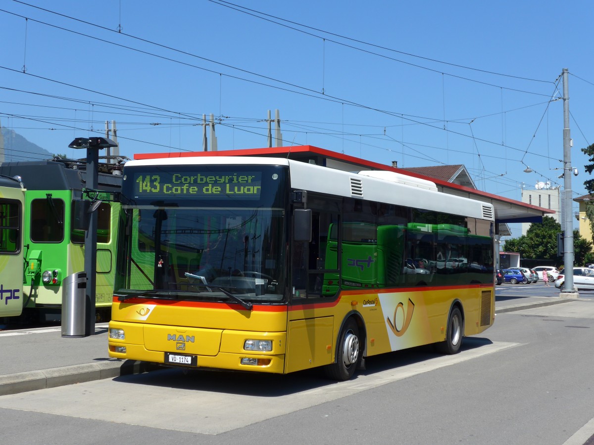 (151'715) - TPC Aigle - VD 1174 - MAN/Gppel am 21. Juni 2014 beim Bahnhof Aigle