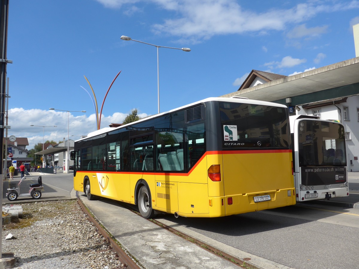 (154'632) - Hfliger, Sursee - Nr. 6/LU 196'102 - Mercedes am 30. August 2014 beim Bahnhof Sursee