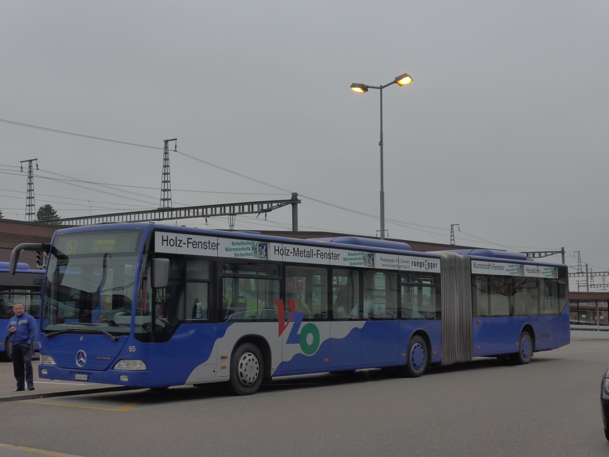 (157'542) - VZO Grningen - Nr. 65/ZH 494'065 - Mercedes am 26. November 2014 beim Bahnhof Wetzikon