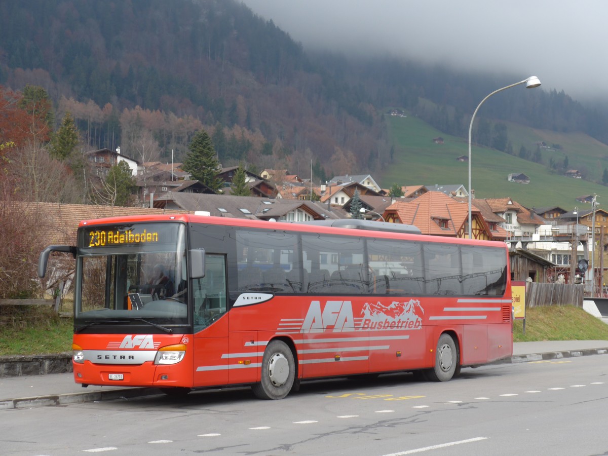 (157'703) - AFA Adelboden - Nr. 24/BE 26'701 - Setra am 7. Dezember 2014 beim Bahnhof Frutigen