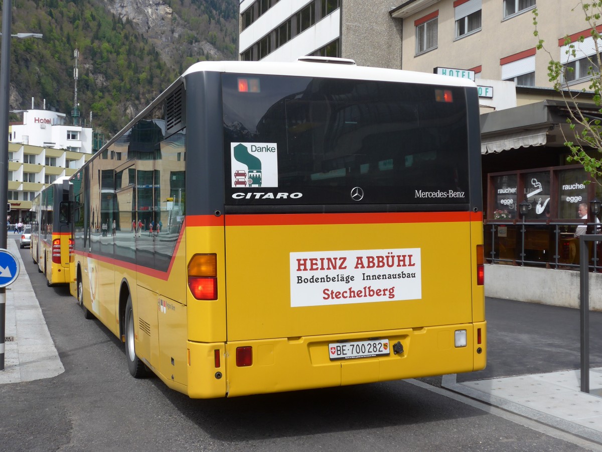 (160'132) - PostAuto Bern - BE 700'282 - Mercedes (ex Schmocker, Stechelberg Nr. 3) am 26. April 2015 beim Bahnhof Interlaken West