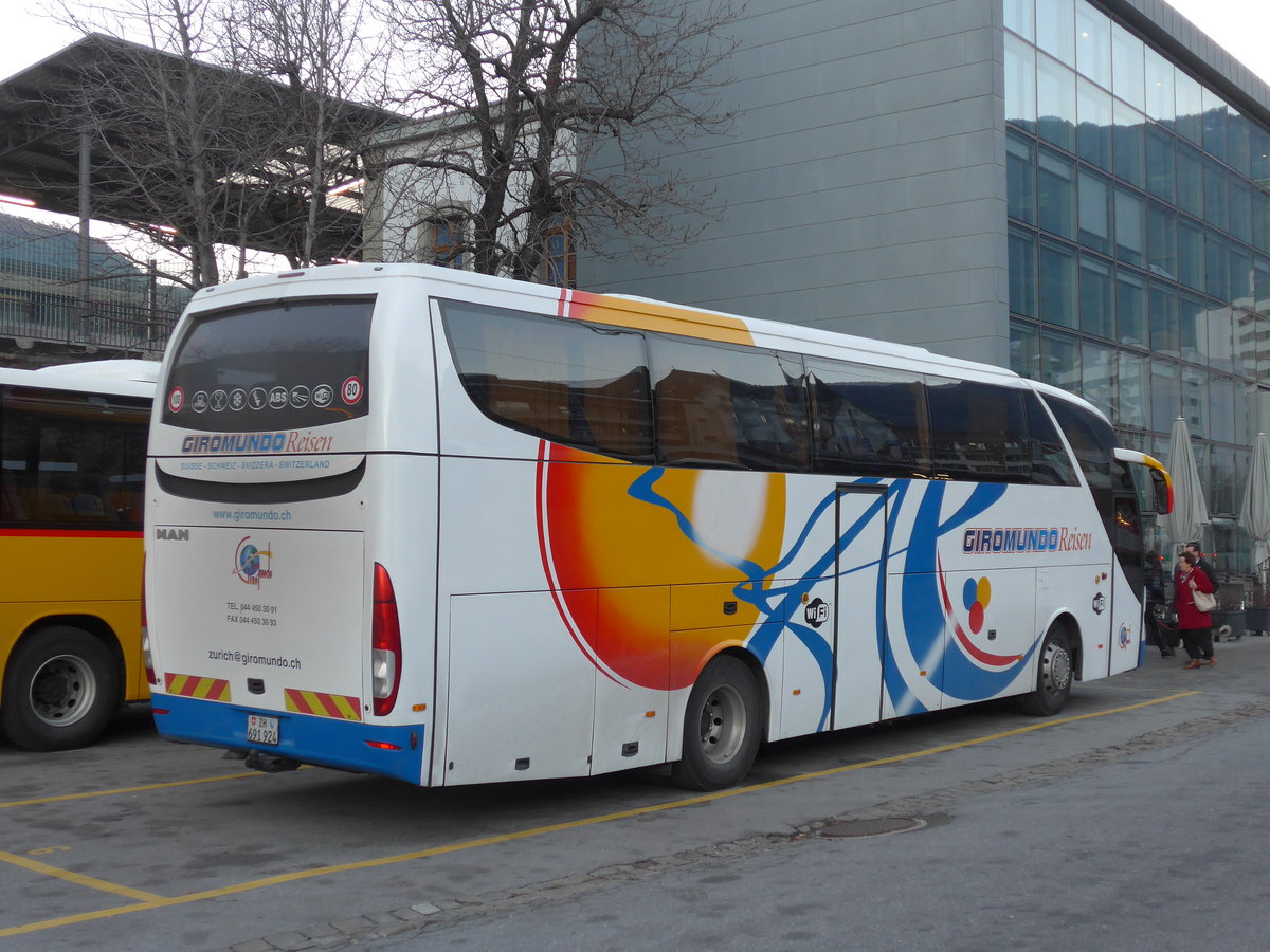 (176'855) - Giromundo, Zrich - ZH 691'924 - MAN/Atomic am 4. Dezember 2016 beim Bahnhof Brig