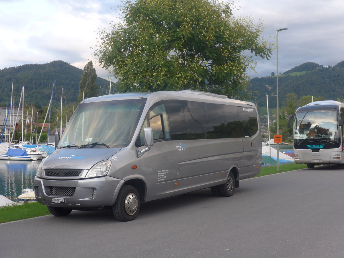 (208'717) - Optop Travel, Opfikon - Nr. 12/ZH 881'262 - Iveco am 15. August 2019 in Thun, Strandbad