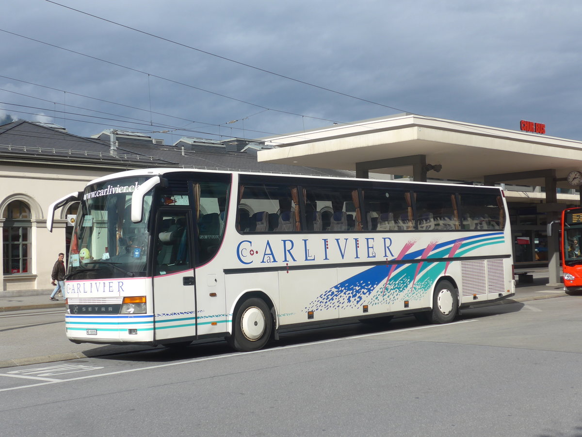 (210'038) - Carlivier, Savagnier - NE 10'115 - Setra am 6. Oktober 2019 beim Bahnhof Chur