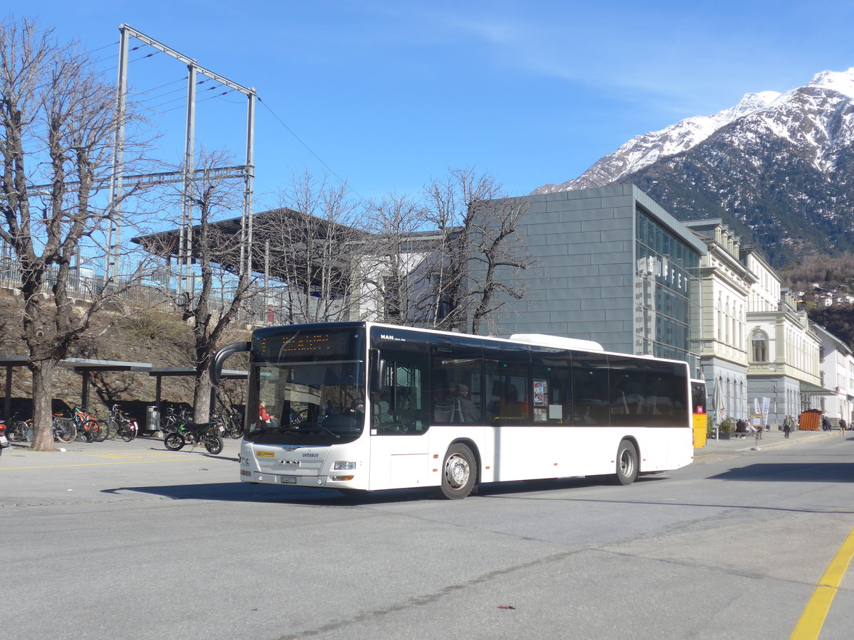 (223'910) - PostAuto Wallis - VS 449'117 - MAN am 2. Mrz 2021 beim Bahnhof Brig