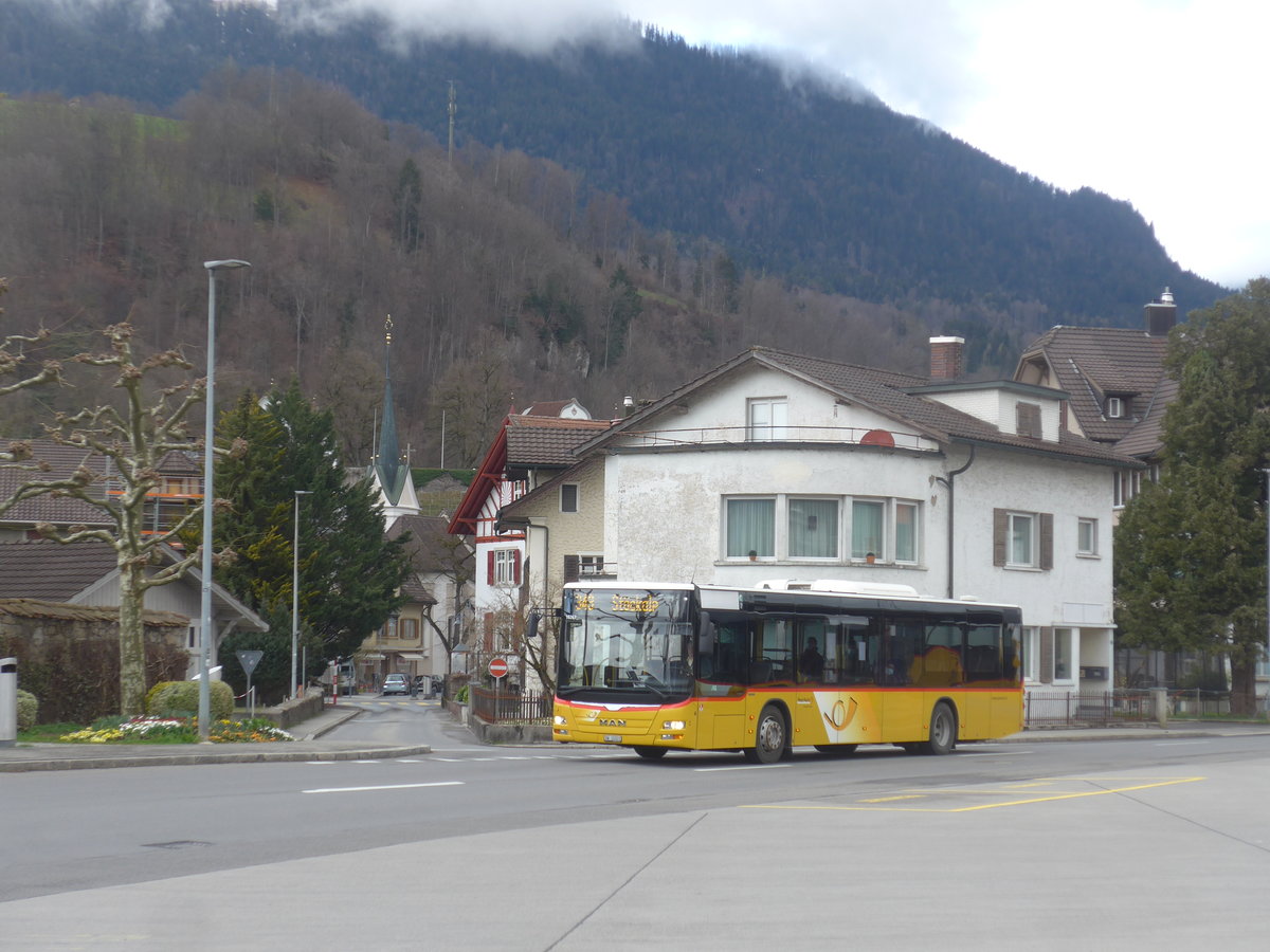 (224'363) - PostAuto Zentralschweiz - Nr. 4/OW 10'023 - MAN (ex Dillier, Sarnen Nr. 4) am 27. Mrz 2021 beim Bahnhof Sarnen