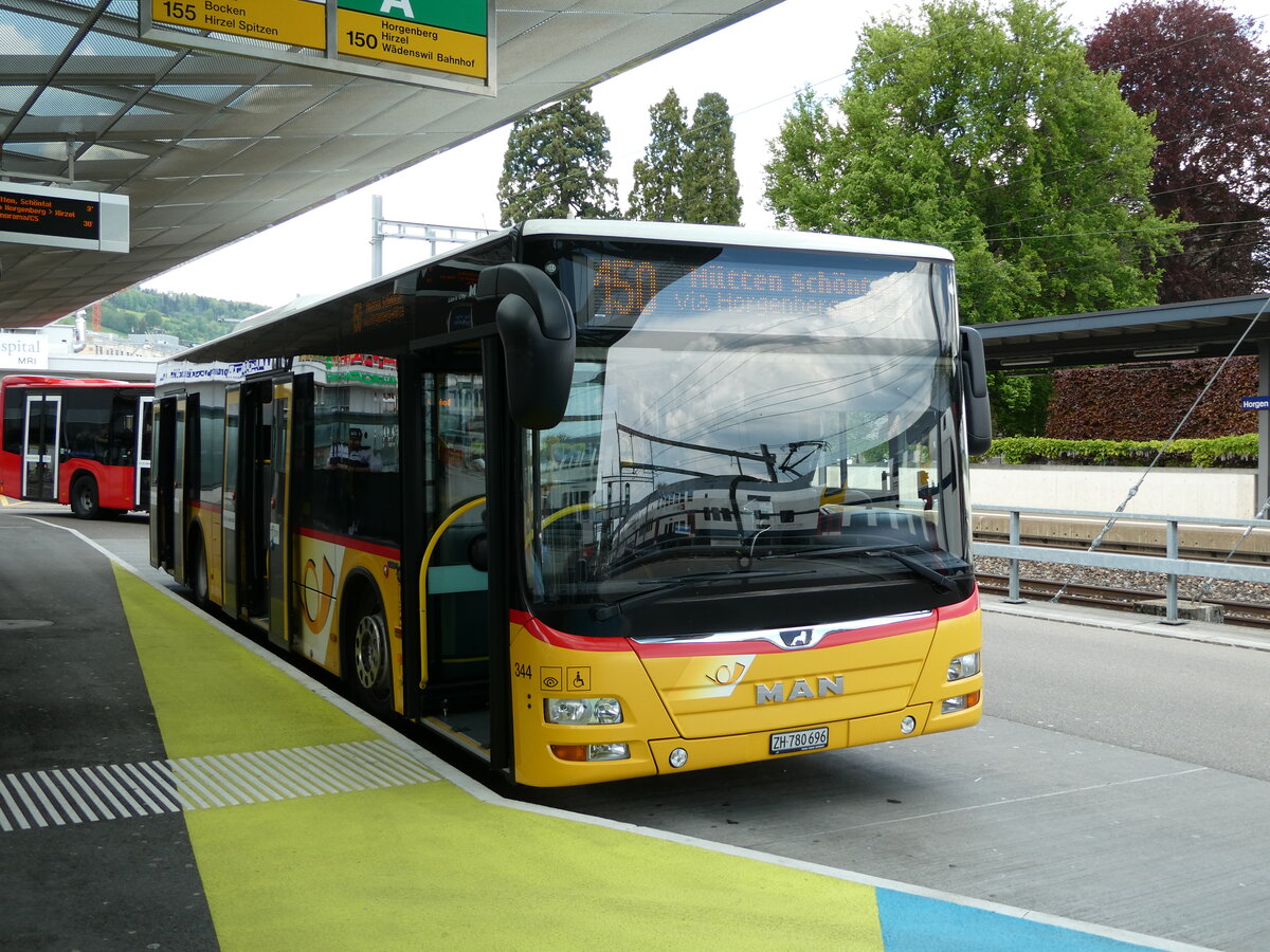 (235'145) - PostAuto Zrich - Nr. 344/ZH 780'696 - MAN am 4. Mai 2022 beim Bahnhof Horgen