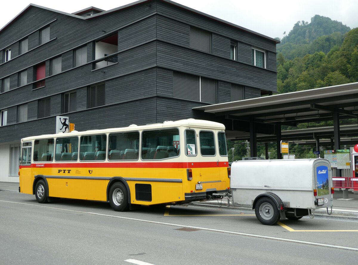 (239'815) - Schmid, Thrishaus - BE 26'206 - Saurer/Tscher (ex P 24'244) am 28. August 2022 beim Bahnhof Giswil