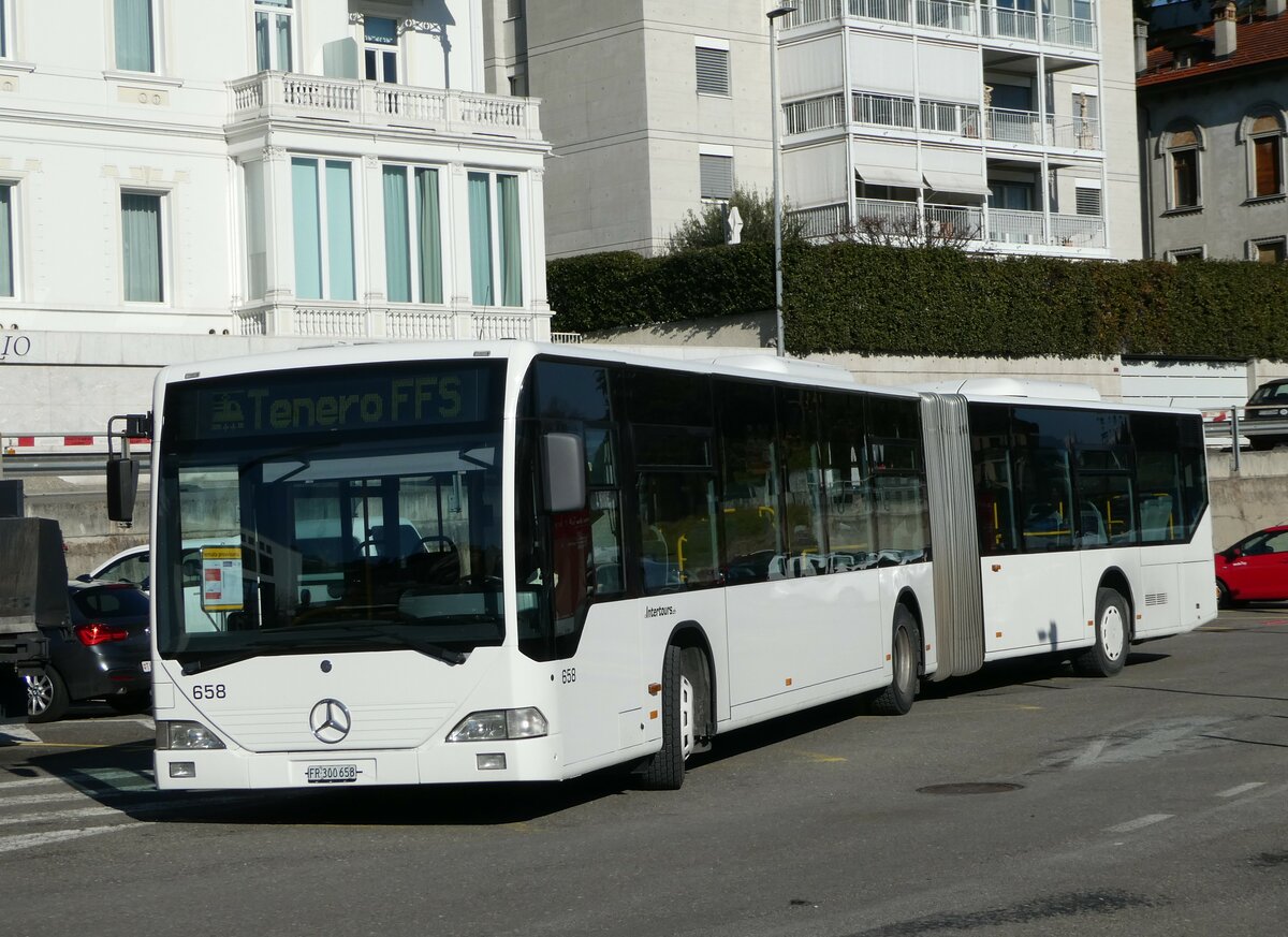 (245'940) - Intertours, Domdidier - Nr. 658/FR 300'658 - Mercedes (ex Nr. 206; ex VZO Grnigen Nr. 51) am 7. Februar 2023 beim Bahnhof Locarno