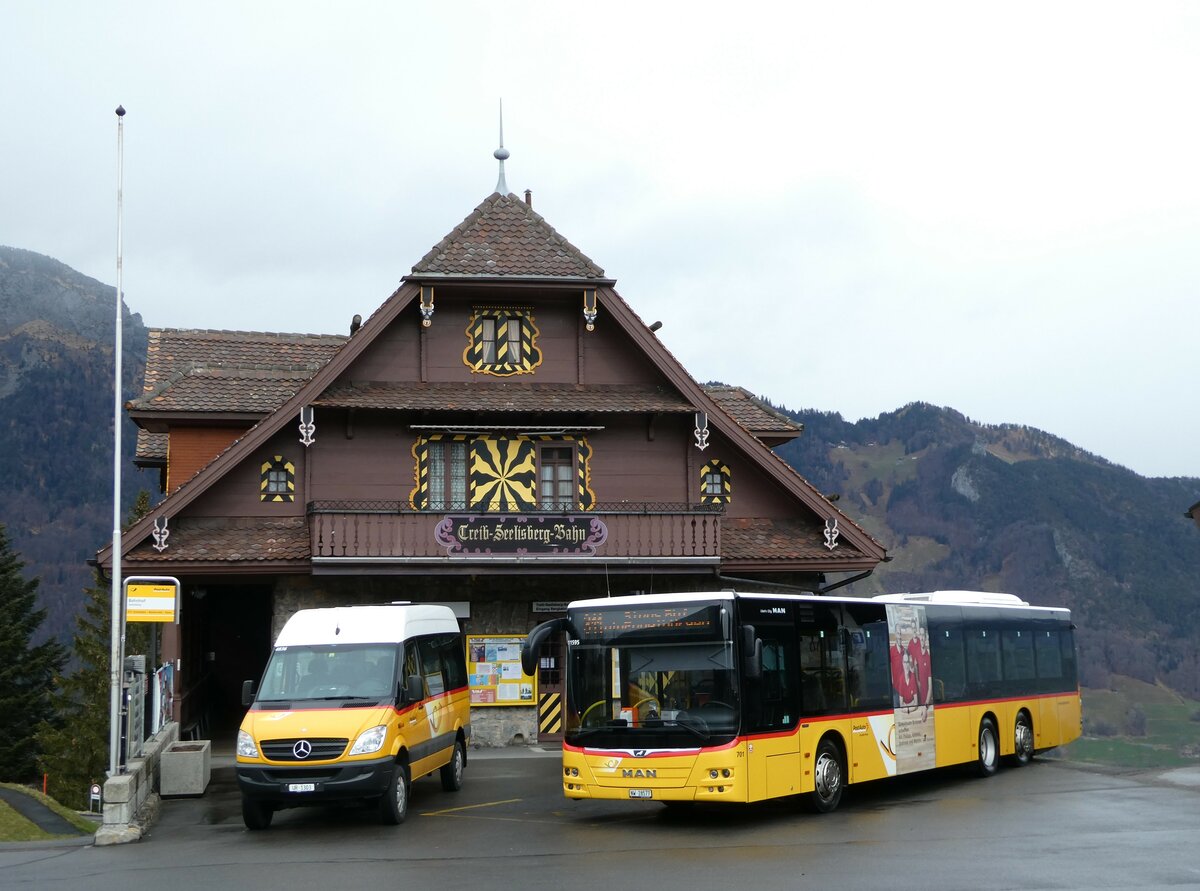 (247'078) - TSB Seelisberg - UR 1303/PID 4836 - Mercedes (ex Schnider, Schüpfheim) + PostAuto Zentralschweiz - Nr. 701/NW 28'577/PID 11'595 - MAN (ex Nr. 71) am 10. März 2023 beim Bahnhof Seelisberg