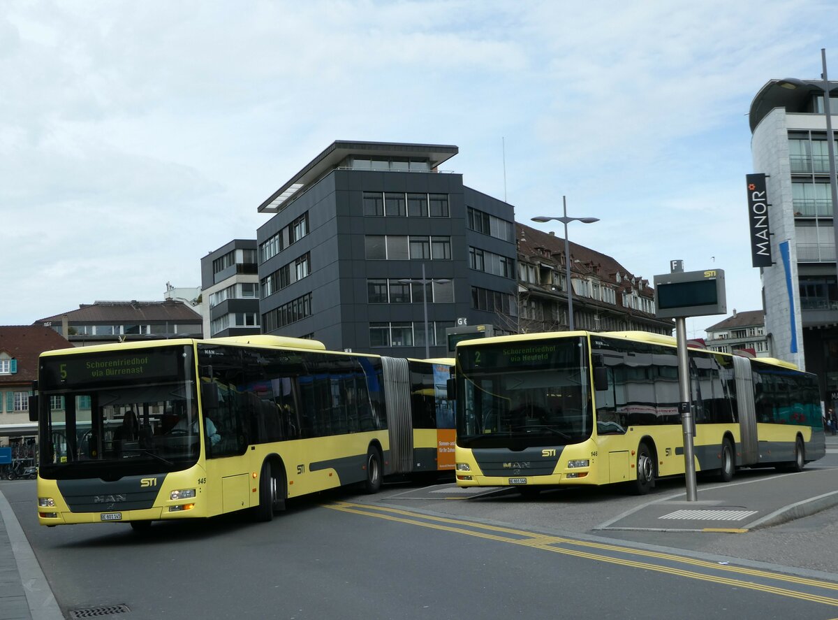 (247'833) - STI Thun - Nr. 145/BE 801'145 + Nr. 146/BE 801'146 - MAN am 29. Mrz 2023 beim Bahnhof Thun