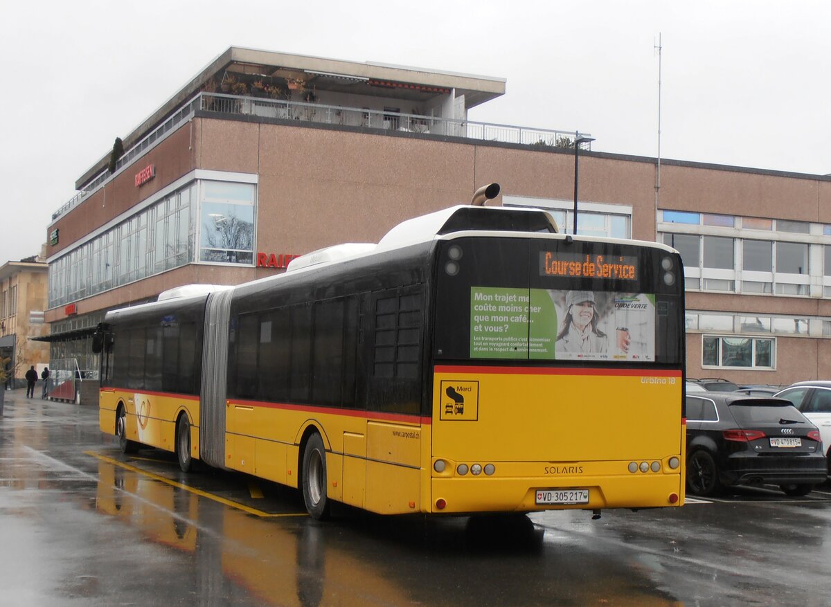 (257'753) - CarPostal Ouest - VD 305'217/PID 10'356 - Solaris am 21. Dezember 2023 beim Bahnhof Yverdon