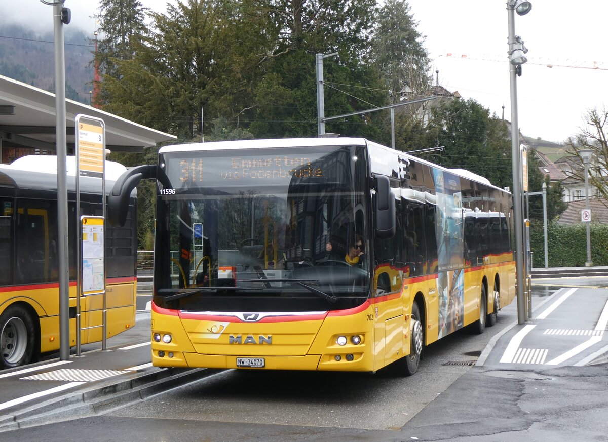 (260'287) - PostAuto Zentralschweiz - Nr. 702/NW 34'070/PID 11'596 - MAN (ex Nr. 72) am 12. Mrz 2024 beim Bahnhof Stans