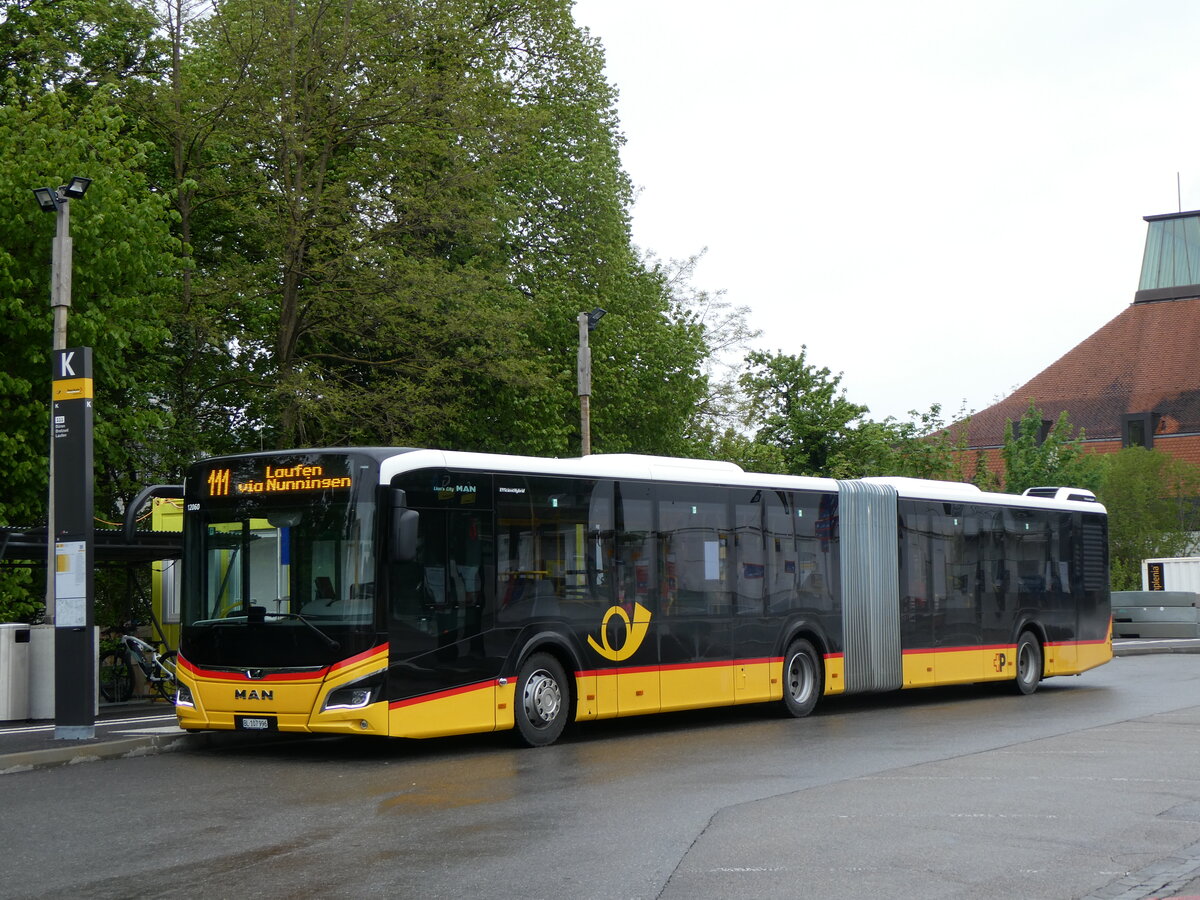 (261'557) - PostAuto Nordschweiz - BL 107'996/PID 12'060 - MAN am 19. April 2024 beim Bahnhof Liestal