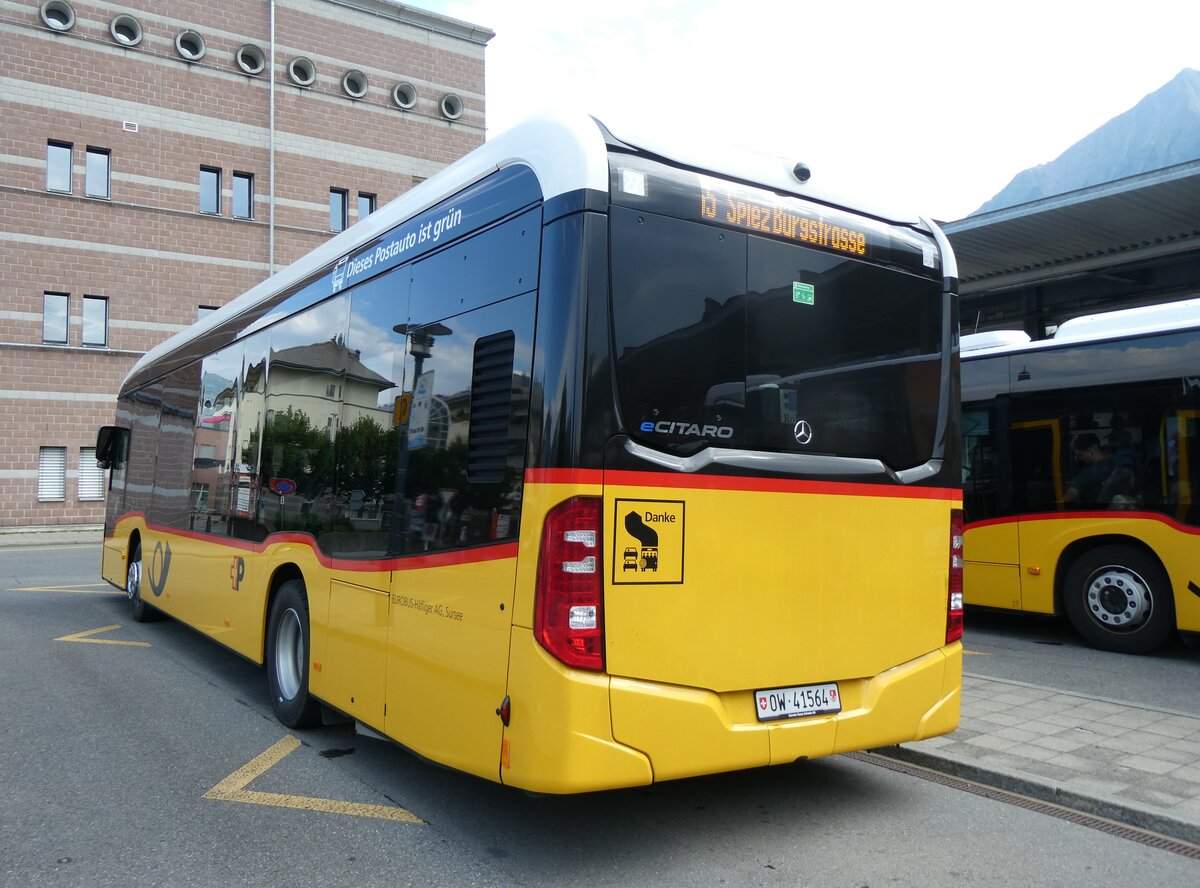 (265'066) - PostAuto Zentralschweiz (Hfliger) - OW 41'564/PID 12'023 - eMercedes am 27. Juli 2024 beim Bahnhof Spiez