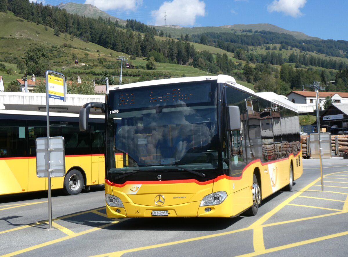 (266'230) - PostAuto Graubnden - GR 162'987/PID 11'695 - Mercedes am 27. August 2024 beim Bahnhof Scuol-Tarasp