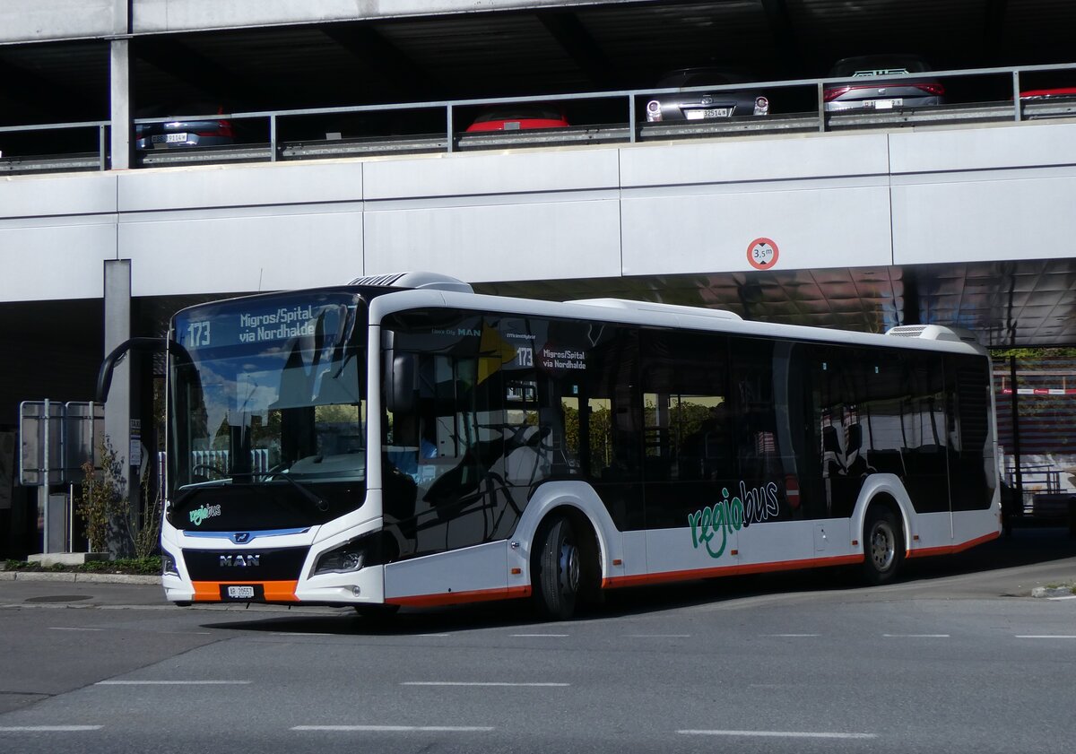 (268'214) - VBH Herisau - Nr. 18/AR 20'557 - MAN am 17. Oktober 2024 beim Bahnhof Herisau