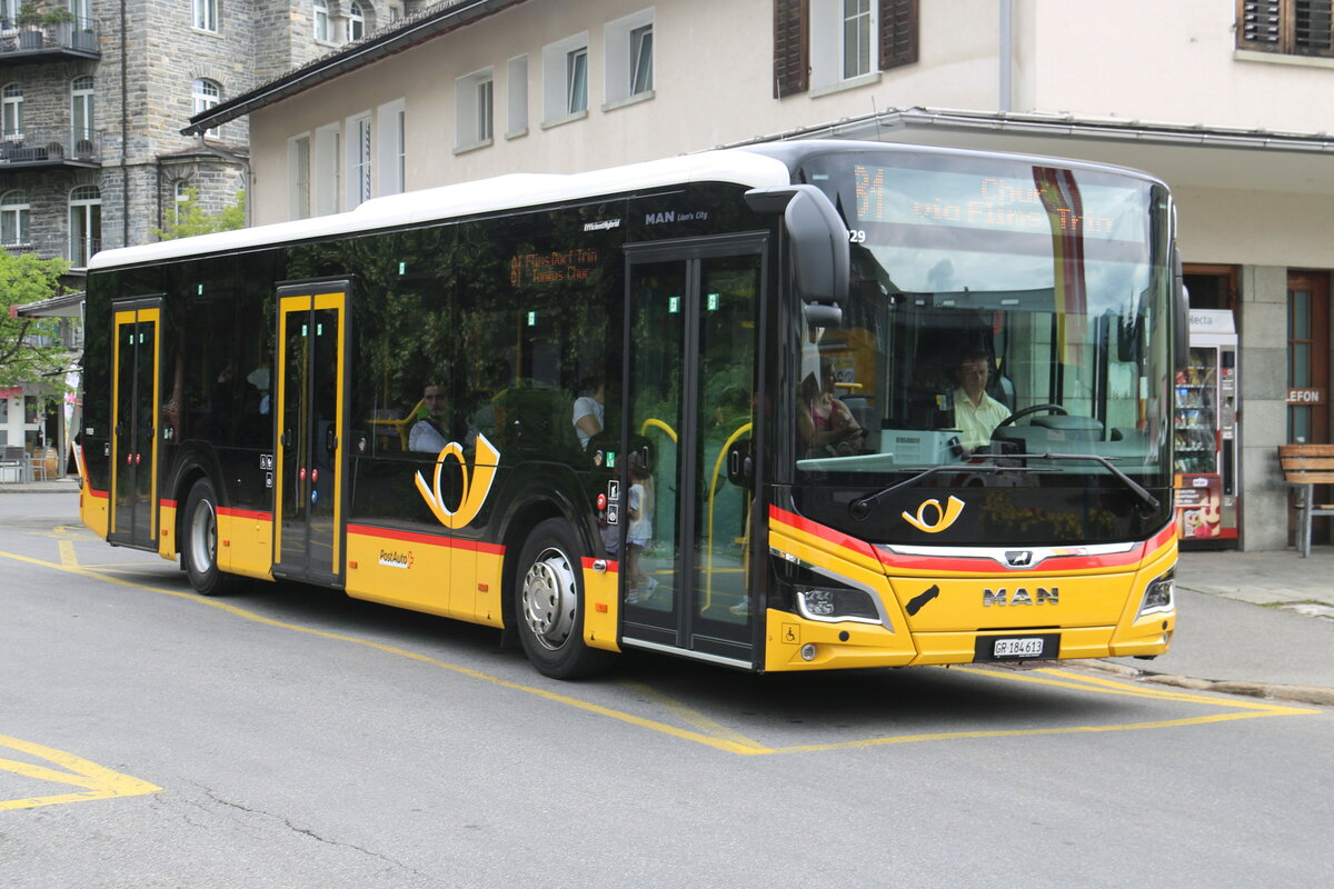 PostAuto Graubnden - GR 184'613/PID 11'929 - MAN am 8. Juli 2023 in Flims (Aufnahme: Martin Beyer)