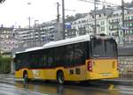 (267'657) - CarPostal Ouest - NE 112'589/PID 10'434 - Mercedes am 1. Oktober 2024 beim Bahnhof Neuchtel